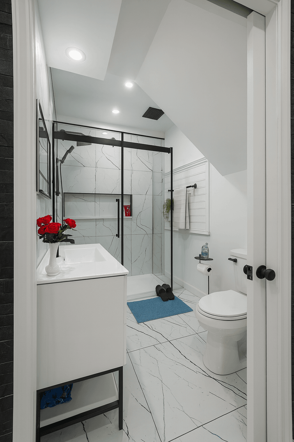 Renovated bathroom with walk-in shower.